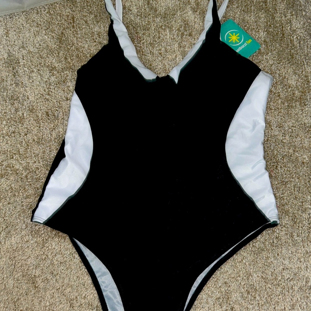 SUNBURST TAN ONE PEICE BATHING SUIT VERY FLATTERING